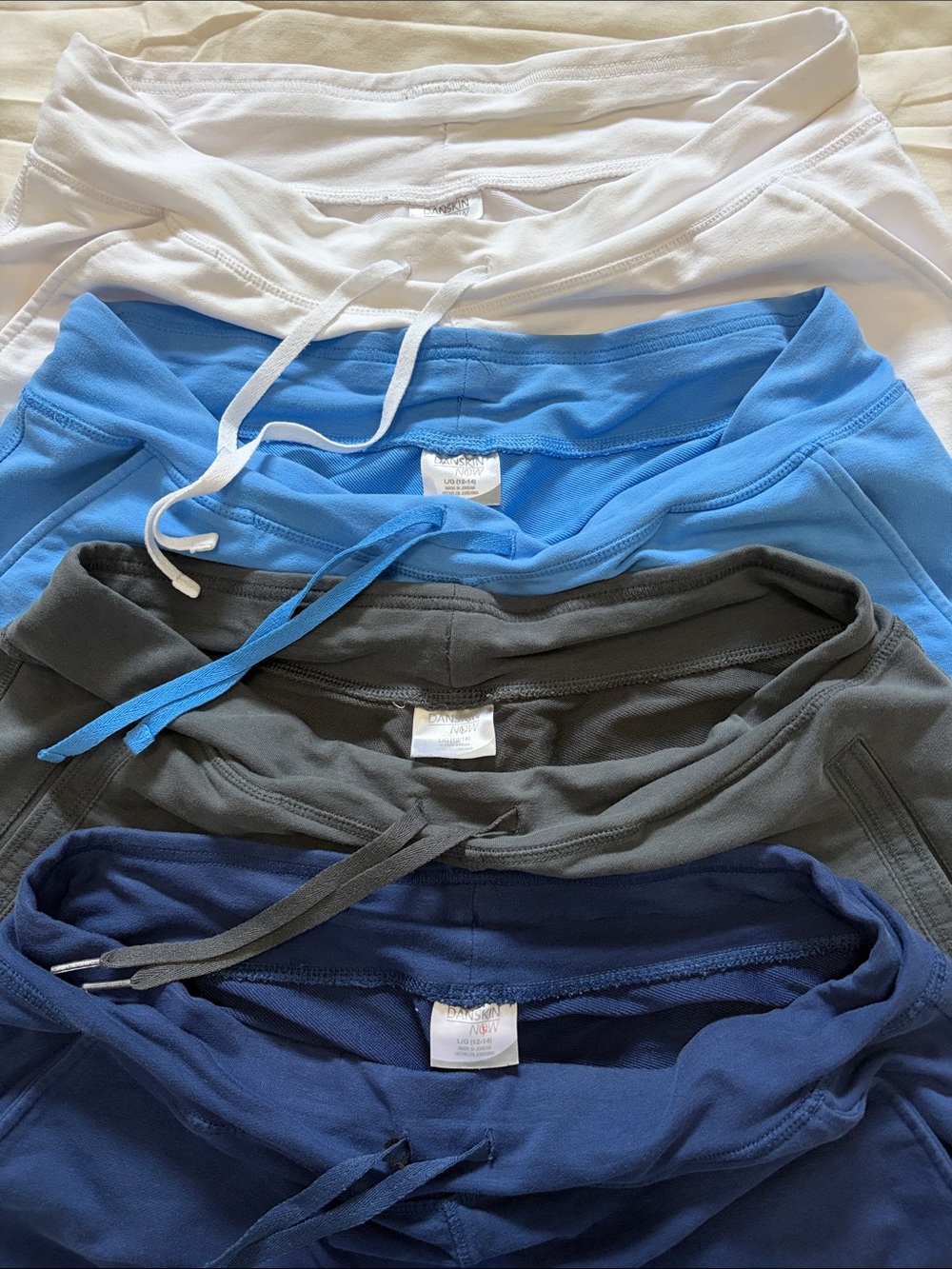Danskin L 12-14 drawstring shorts lot of four, white gray navy sky blue